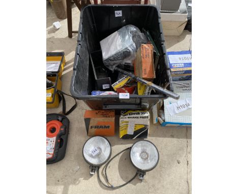 AN ASSORTMENT OF AUTOMOBILE SPARES TO INCLUDE HEADLIGHTS, AND BRAKE PADS ETC 