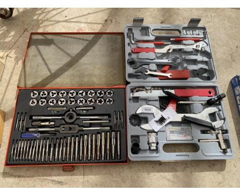AN ASSORTMENT OF TOOLS TO INCLUDE A TAP AND DIE SET AND SPANNER SET ETC 