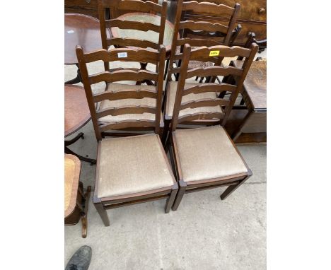 A SET OF FOUR OAK LADDER BACK DINING CHAIRS BEARING LABEL 'A QUEENS FACTORY PRODUCT' 