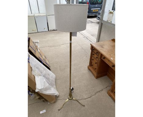 A BRASS STANDARD LAMP WITH SHADE 