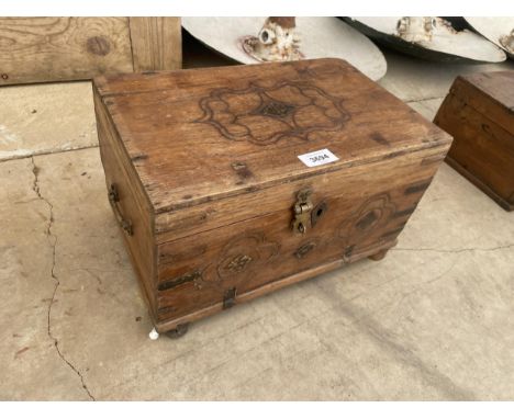 A SMALL VINTAGE INDIAN HARDWOOD DOWRY CHEST 