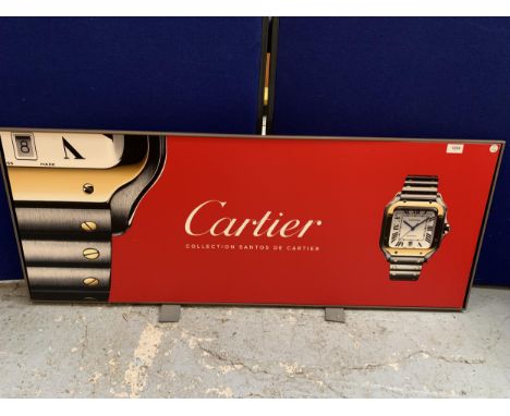 A MODERN PRINT ON BOARD ENTITLED "CARTIER COLLECTION SANTOS DE CARTIER" 