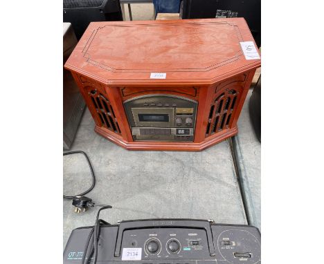 A RETRO STYLE PORTABLE RECORD PLAYER 