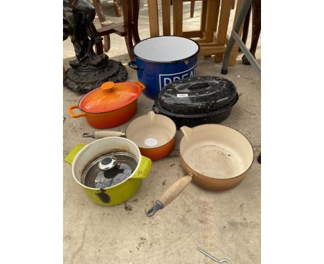 AN ASSORTMENT OF CAST IRON AND ENAMEL COOKING POTS TO INCLUDE LE CREUSET ETC 
