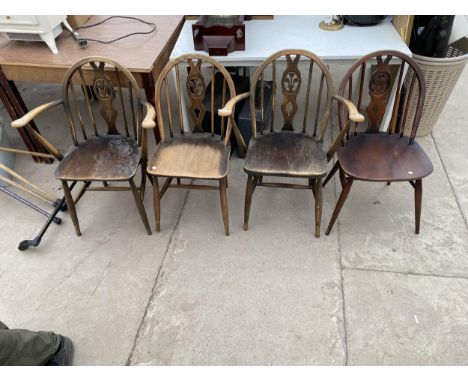 FOUR ERCOL BLUE LABEL PLUME OF FEATHERS DINING CHAIRS, TWO BEING CARVERS 
