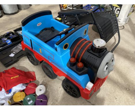 AN ELECTRIC CHILDRENS RIDE ALONG THOMAS THE TANK ENGINE WITH CHARGER 
