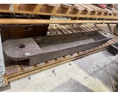 A LARGE INDIAN HARDWOOD TROUGH 