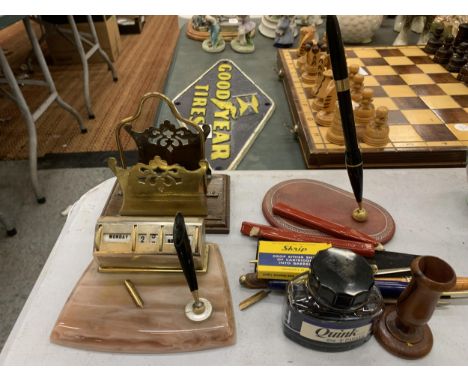 AN ASSORTMENT OF DESK ITEMS TO INCLUDE A PEN HOLDER WITH CALANDER, A LETTER RACK, ETC 