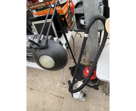 A LAMP, A VACUUM CLEANER AND A HEATER 