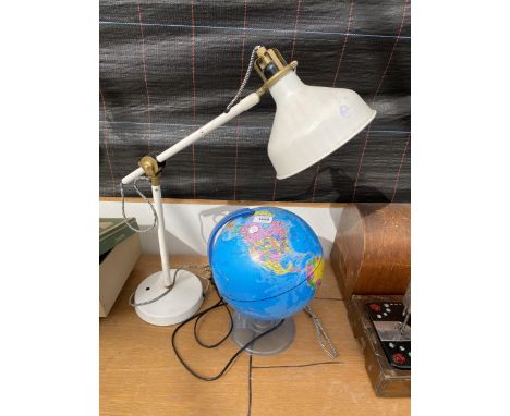 A LIGHT UP GLOBE AND A FURTHER ADJUSTABLE TABLE LAMP 