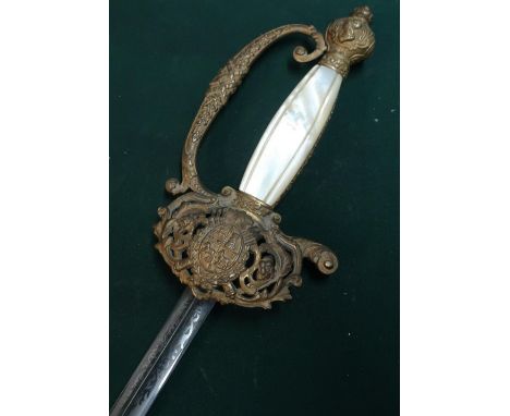 Gilt hilted and mother of pearl gripped court style sword with 30.5inch triform blade with various engraved scrollwork and co