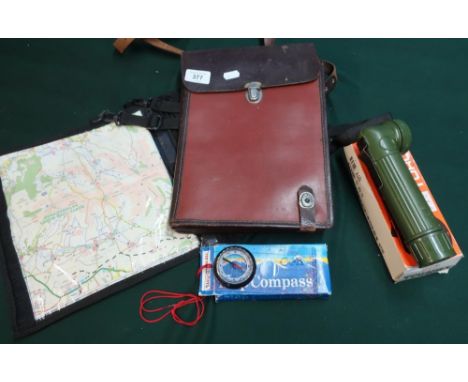 Part leather folding map case, a modern map case, compass and right angled torch 