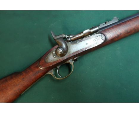 Snider action three band rifle with fixed fore sights and adjustable rear ladder sights, with 36 inch barrel, the lock marked