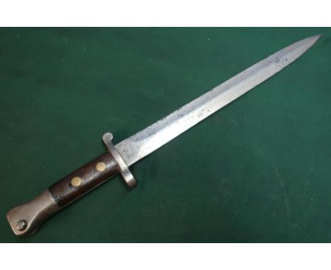 Wilkinson of London bayonet with 12 inch double edged blade, with various stamp markings and two piece grips 