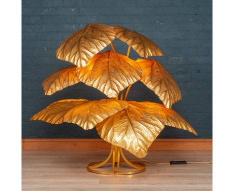 Decorative/Interior Design: A nine leaf brass floor lamp by Tommaso Barbi, Italian, circa 1970, 147cm high by 127cm wide by 1