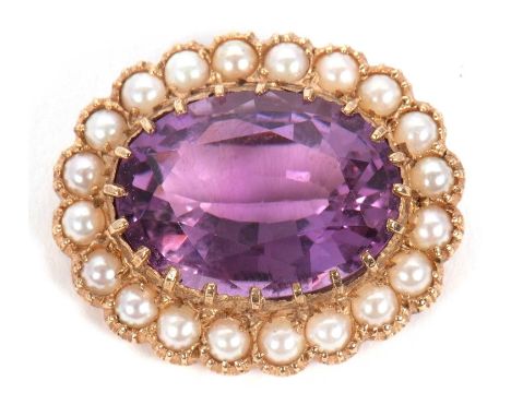 A 9ct amethyst and pearl brooch, the oval mixed cut amethyst surrounded by split cultured pearls, hallmarked to reverse Londo