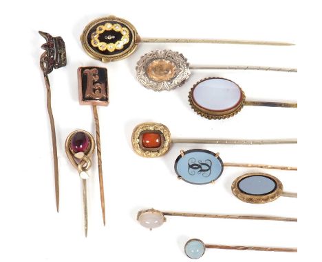 A quantity of assorted stick pins: to include garnet, agate and others, 20g gross, (11)