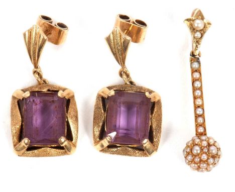 A pair of amethyst earrings and a seed pearl pendant, the emerald cut amethysts claw mounted in squared textured surrounds an