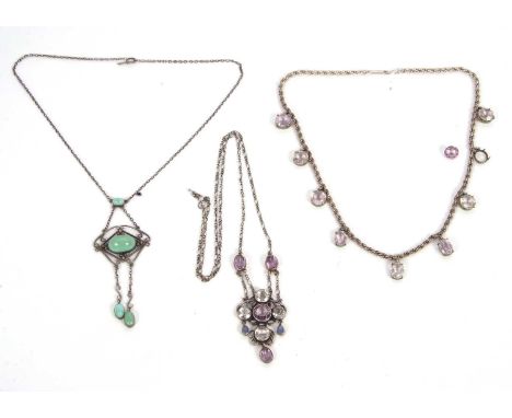 Three gemset necklaces: to include an early 20th century a turquoise necklace, set in unmarked white metal (tests as silver),