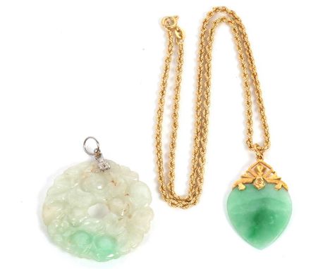 A rope twist necklace and two jade pendants: the rope twist necklace with tag stamped 750, clasp stamped 750, 45cm long, 11.6