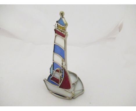 A leaded glass lighthouse design tea light holder, 16cm high   