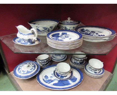 A Royal Doulton "Real Old Willow" eight place setting dinner service, to include meat plate, side plates, soup cups and plate