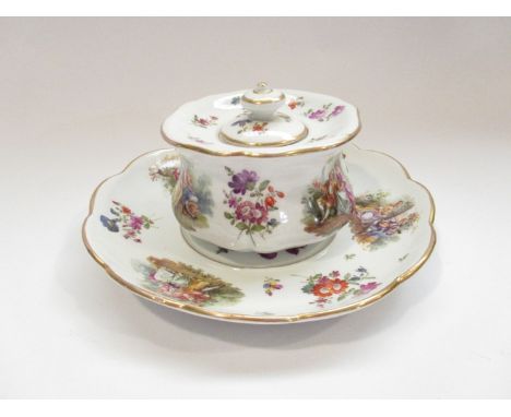 A 20th Century Meissen porcelain inkwell and saucer, all over floral sprays and scenes of courting couples
