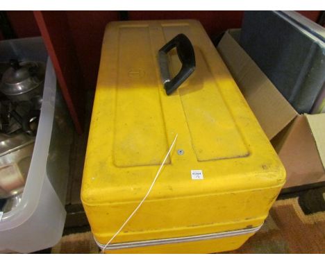 A cantilever toolbox containing coral stones