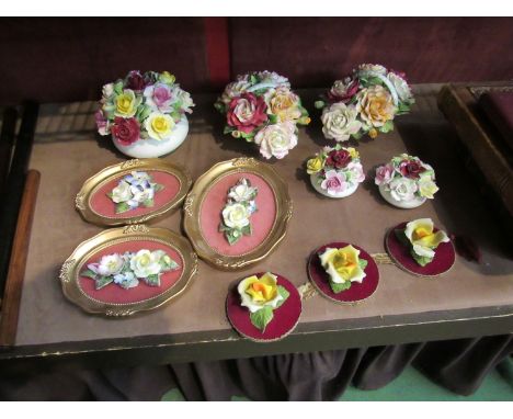 A quantity of ceramic flower posies, some on plaques (11) 