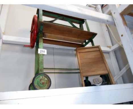 A vintage Tri-ang child's mangle and washboard