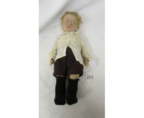 A vintage felt boy doll, 42 cm.