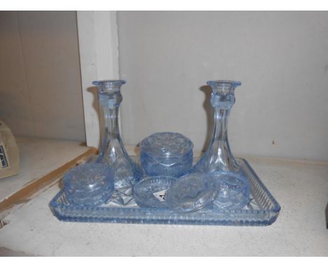 A 1930's blue glass trinket set