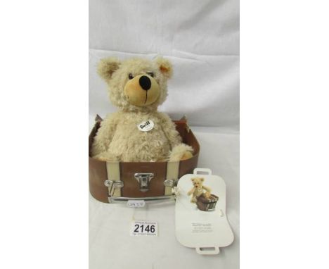 A Steiff 'Charley' bear with suitcase.