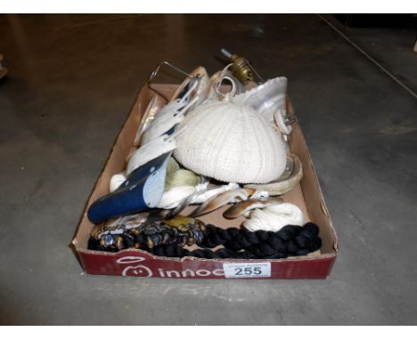 A pair of sea shell lamp shades and other sea shell items