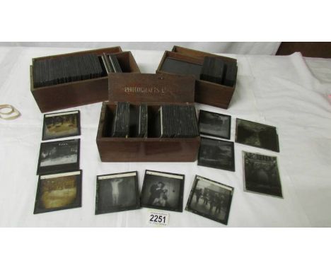 3 wooden boxes of glass lantern slides including 33 plates 'Army medical treatments for gas attacks', 26 plates 'Bomb damage 