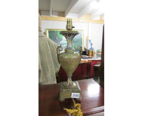 A Cloissonne enamelled onyx and brass table lamp.