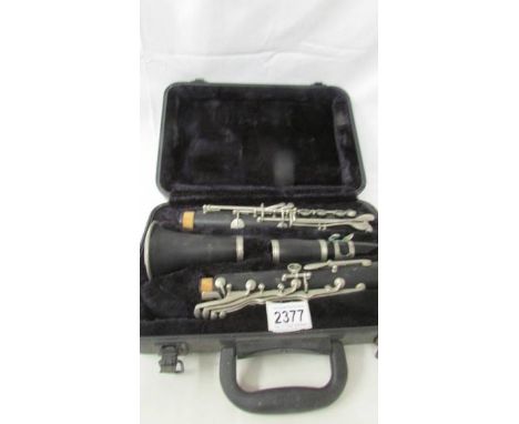A cased Blessing clarinet.