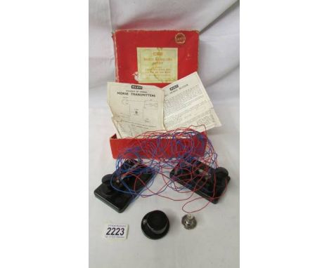 A vintage Merit Morse Signalling kit, complete.