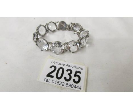 A vintage quality made white paste bracelet in silver (matches lot 2034).