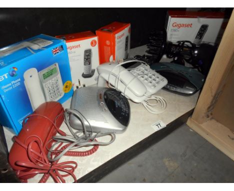 A quantity of telephones plus 2 radio alarm clocks etc.