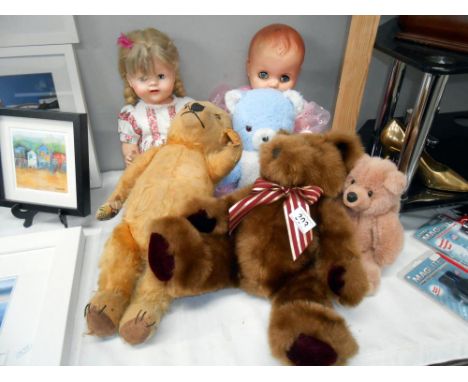 A vintage teddy in tired condition plus 3 others and 2 old dolls