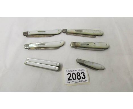 5 silver and mother of pearl penknives and one other item. ****Condition report**** All blades need cleaning, the smallest kn