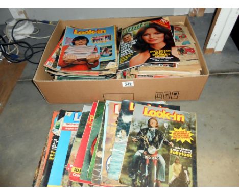 A box of vintage magazines including Scoop, Look-In, Titbits, and some comics ****Condition report**** The posters are missin