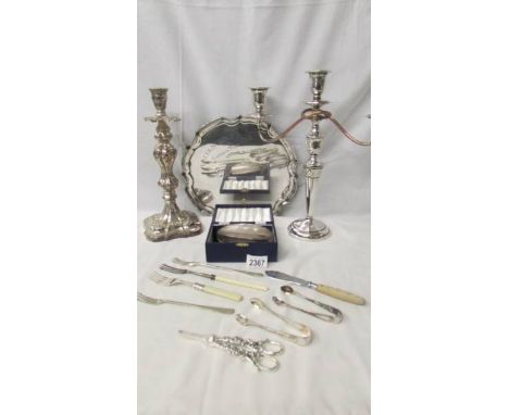 A silver plate candelabra, silver plate candlestick, silver plate candelabra, pickle forks etc.,