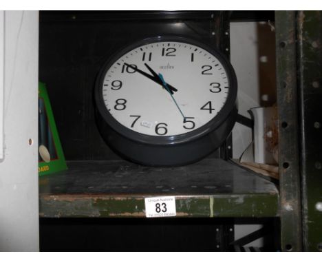 A large Quartz Acctime retro wall clock