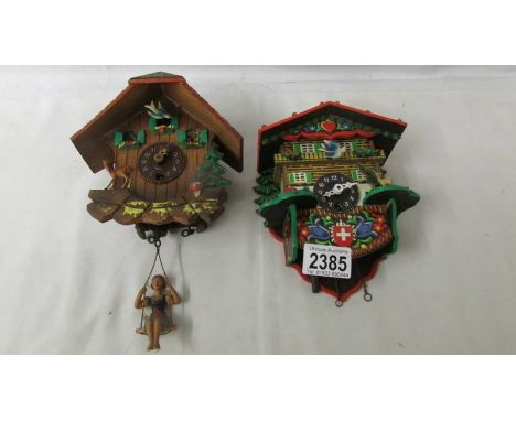 2 vintage German/Swiss cuckoo clocks.