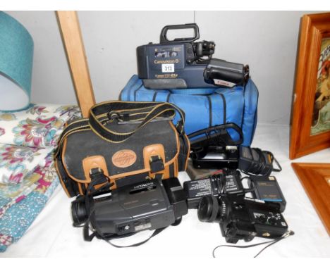 A vintage Canon VM-E1N Canonvision 8 and Hitachi VM-E54E camcorder etc.