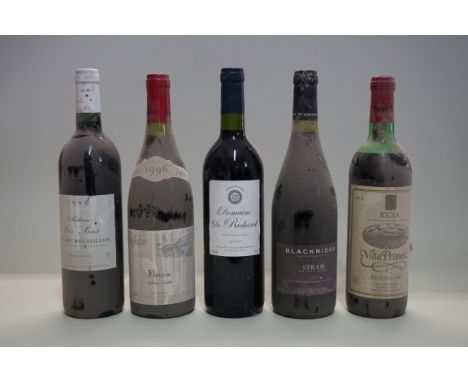 Five various bottles of red wine. (5) 