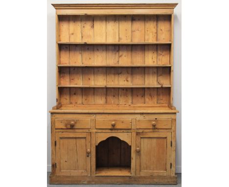 19TH CENTURY PEMBROKESHIRE (NOW STRIPPED) PINE DRESSER, having moulded cornice over three shelf, boarded, rack back, the base