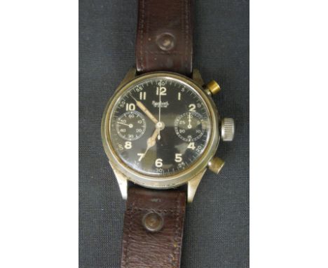 GERMAN HANHART STEEL OR NICKEL CASED PILOT'S WATCH, having black face with white Arabic numerals, two subsidiary dials for se